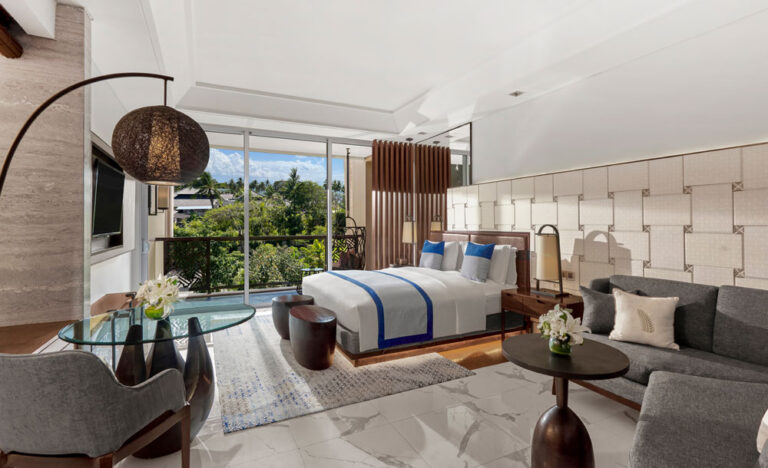 Luxury room with king bed and tropical resort view at Sofitel Bali Nusa Dua