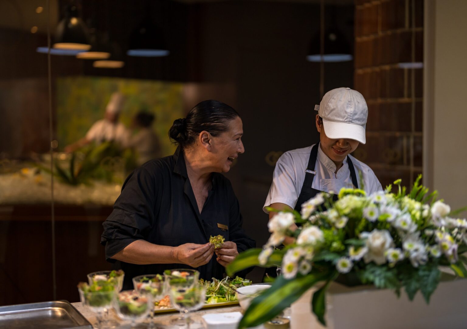 Chefs preparing Unload Mama’s Secret Recipe at Cucina