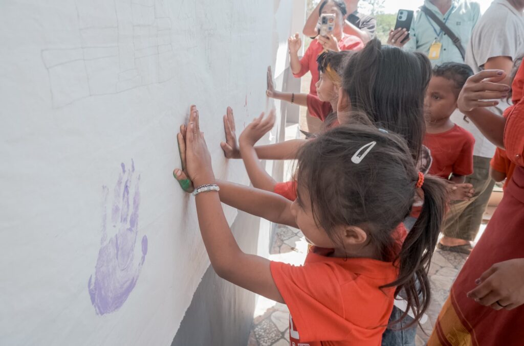 children-handprint-school-opening-tk-negeri-poma
